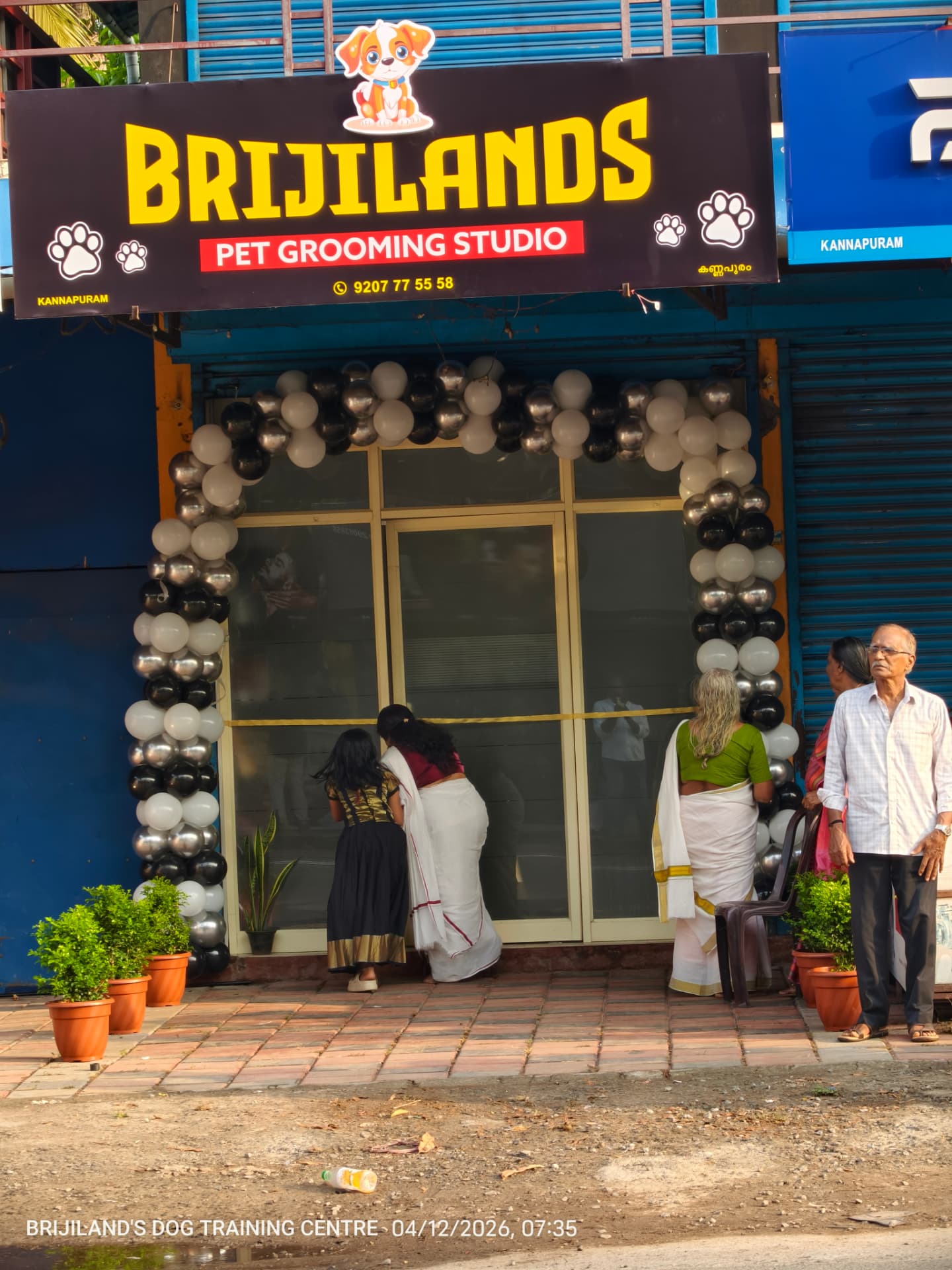 Brijilands Pet Grooming Studio storefront in Kannapuram with golden yellow and red signage